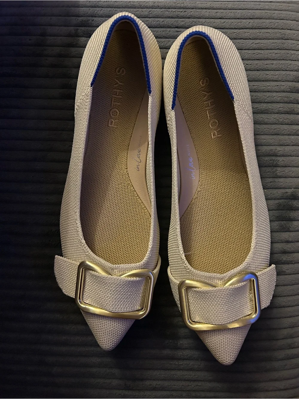 Rothy's “The Emblem Point II” pointed flats with gold hardware